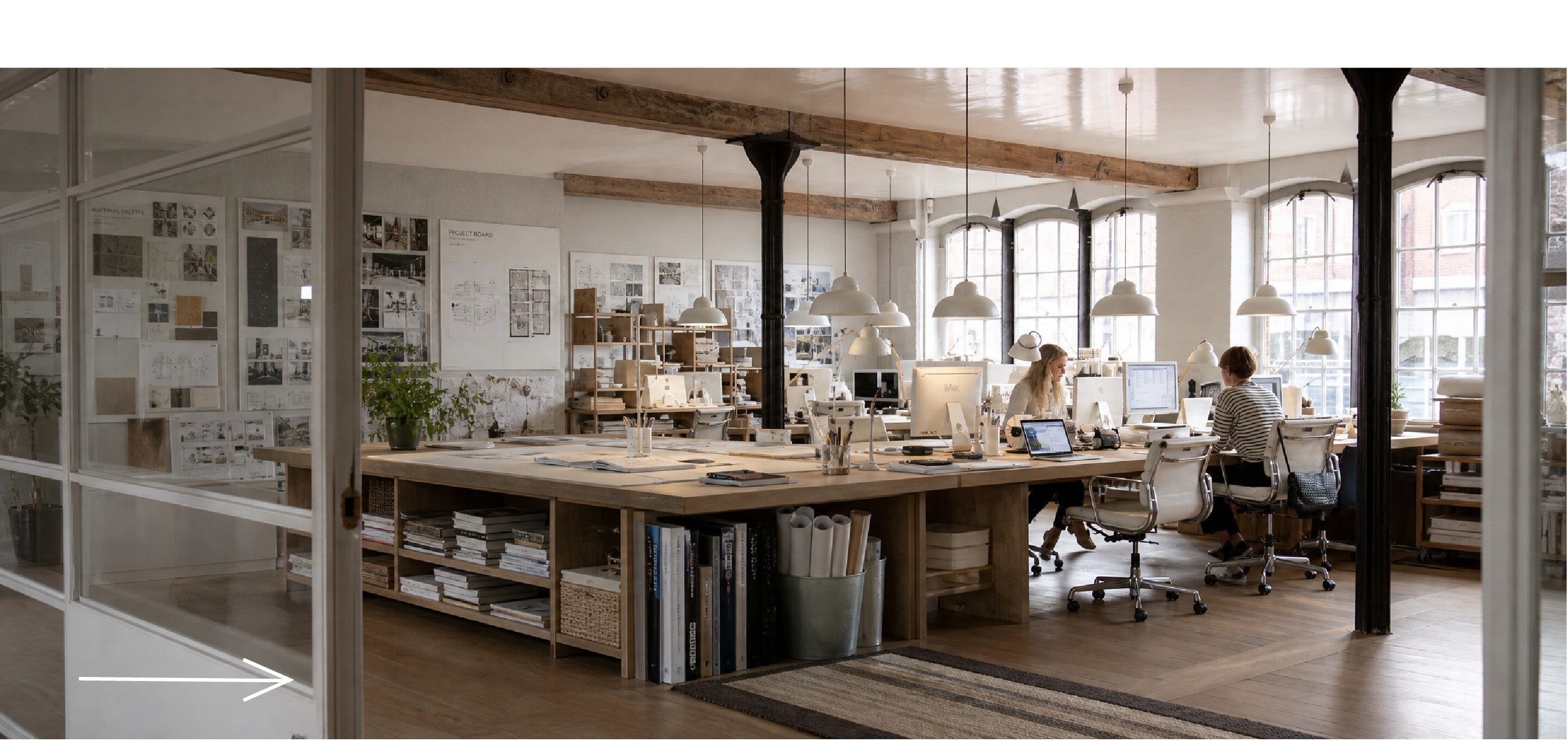 White Pix studio workspace filled with daylight, creative desks and production equipment