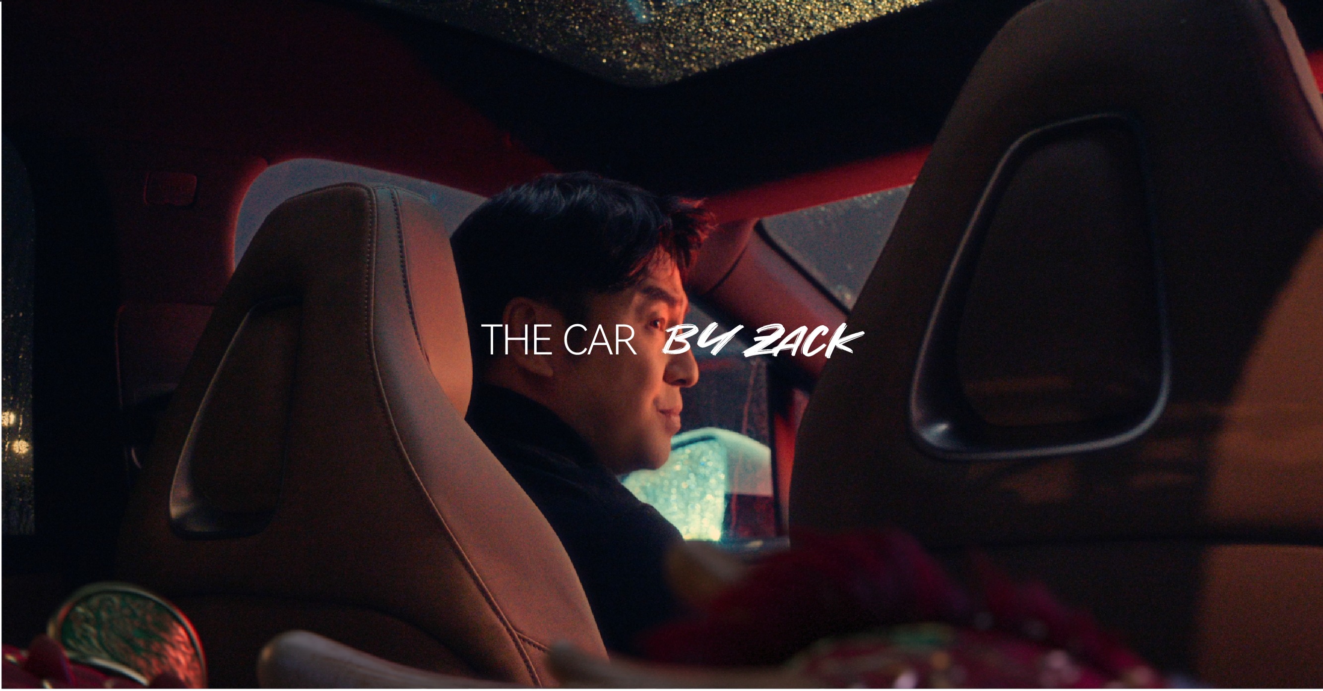 Cinematic portrait inside a sports car at night